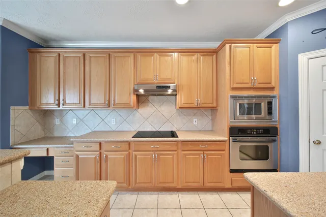 $475,000 | 12802 Mossy Ledge Drive, Tomball, TX 77377