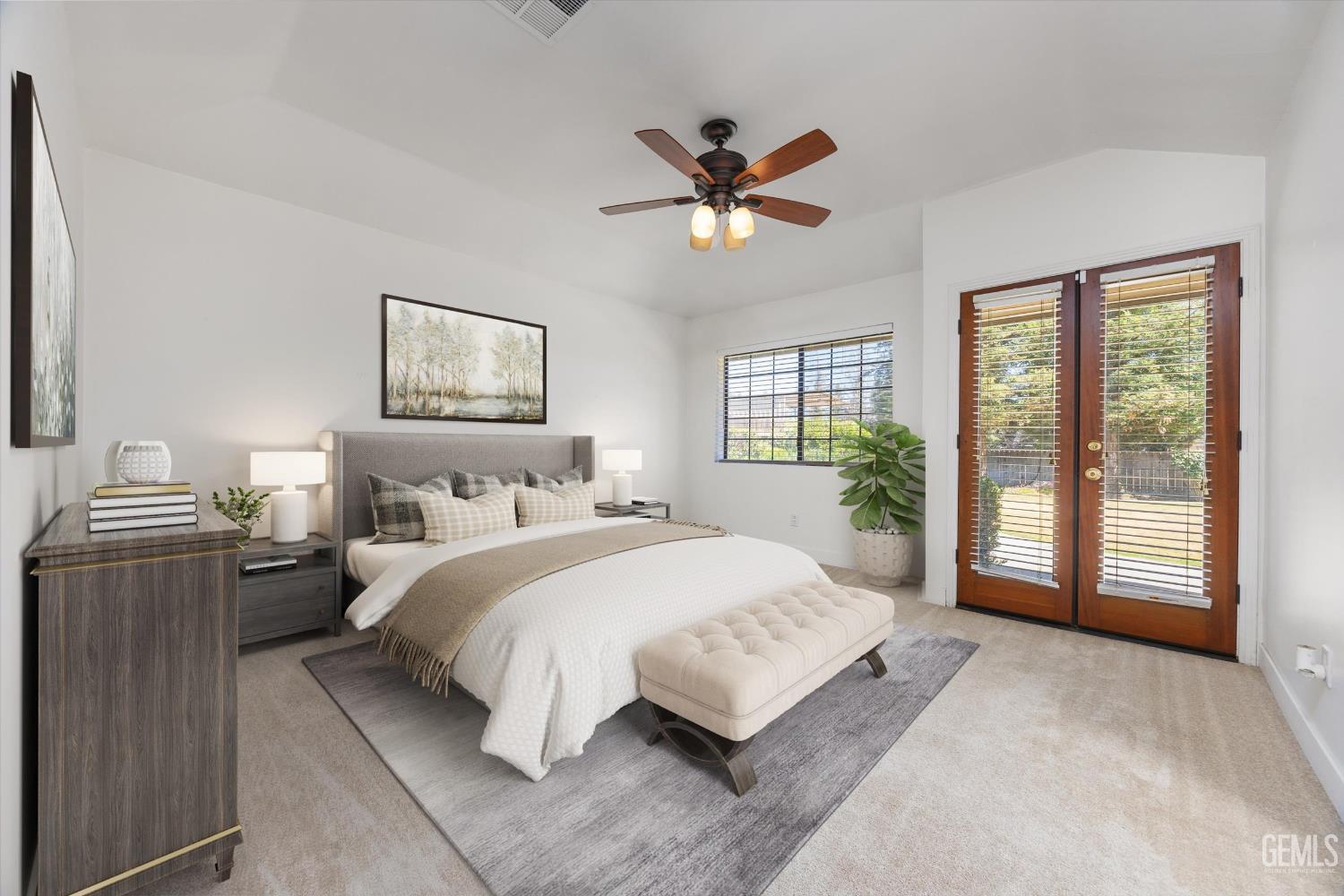 Undisclosed Address Bakersfield, CA 93314 - Photo 16 of 69 a spacious bedroom with a large bed and a large window