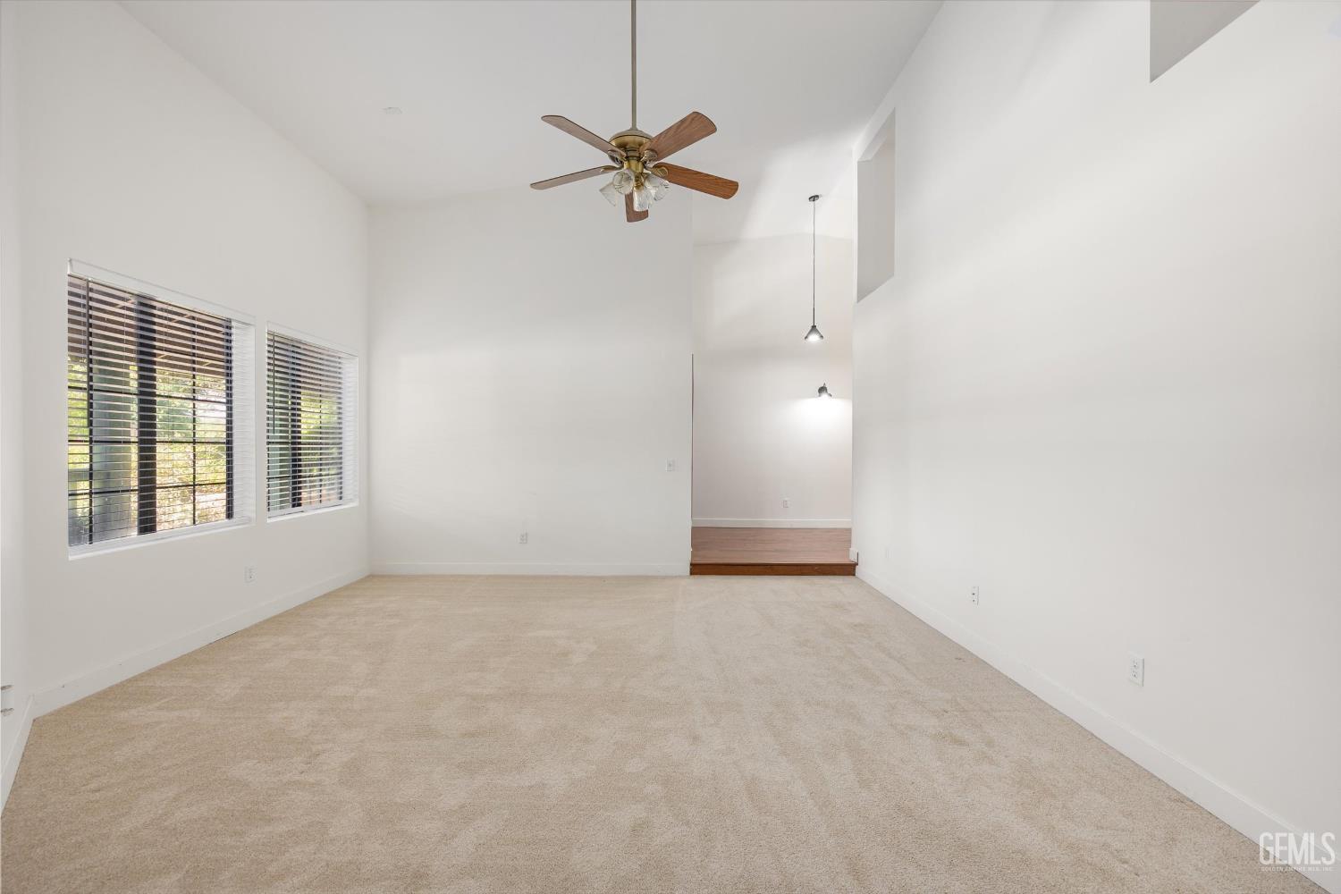 Undisclosed Address Bakersfield, CA 93314 - Photo 23 of 69 an empty room with fan and windows