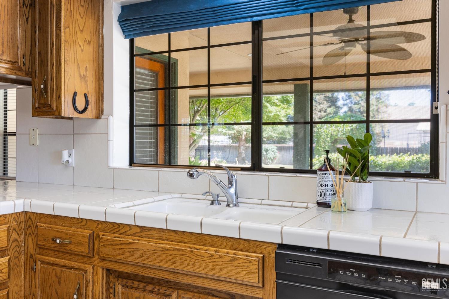 Undisclosed Address Bakersfield, CA 93314 - Photo 34 of 69 a kitchen with sink and large window