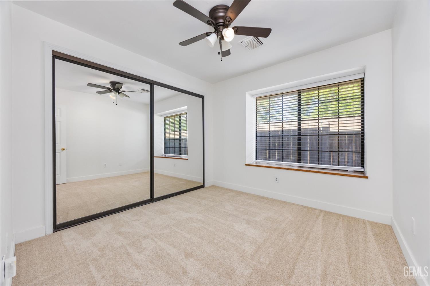 Undisclosed Address Bakersfield, CA 93314 - Photo 46 of 69 a view of an empty room with a window