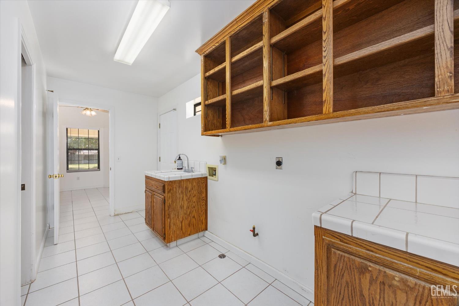 Undisclosed Address Bakersfield, CA 93314 - Photo 50 of 69 a view of an empty room with wooden cabinet