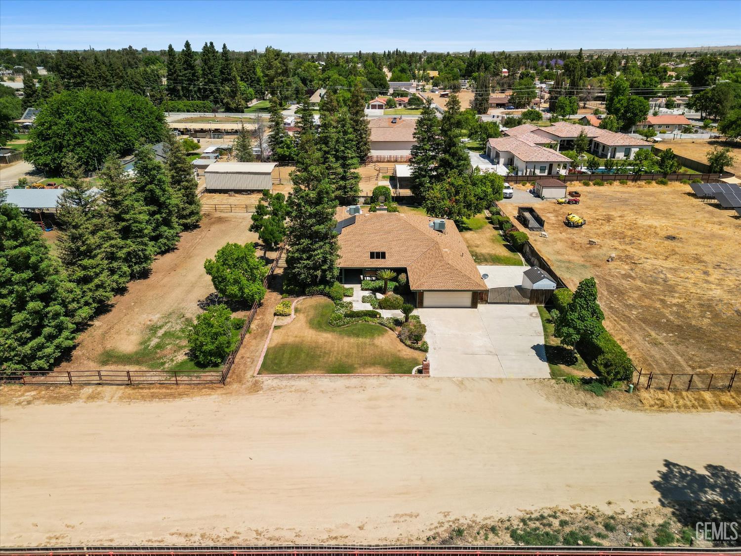 Undisclosed Address Bakersfield, CA 93314 - Photo 5 of 69 an aerial view of residential houses with outdoor space
