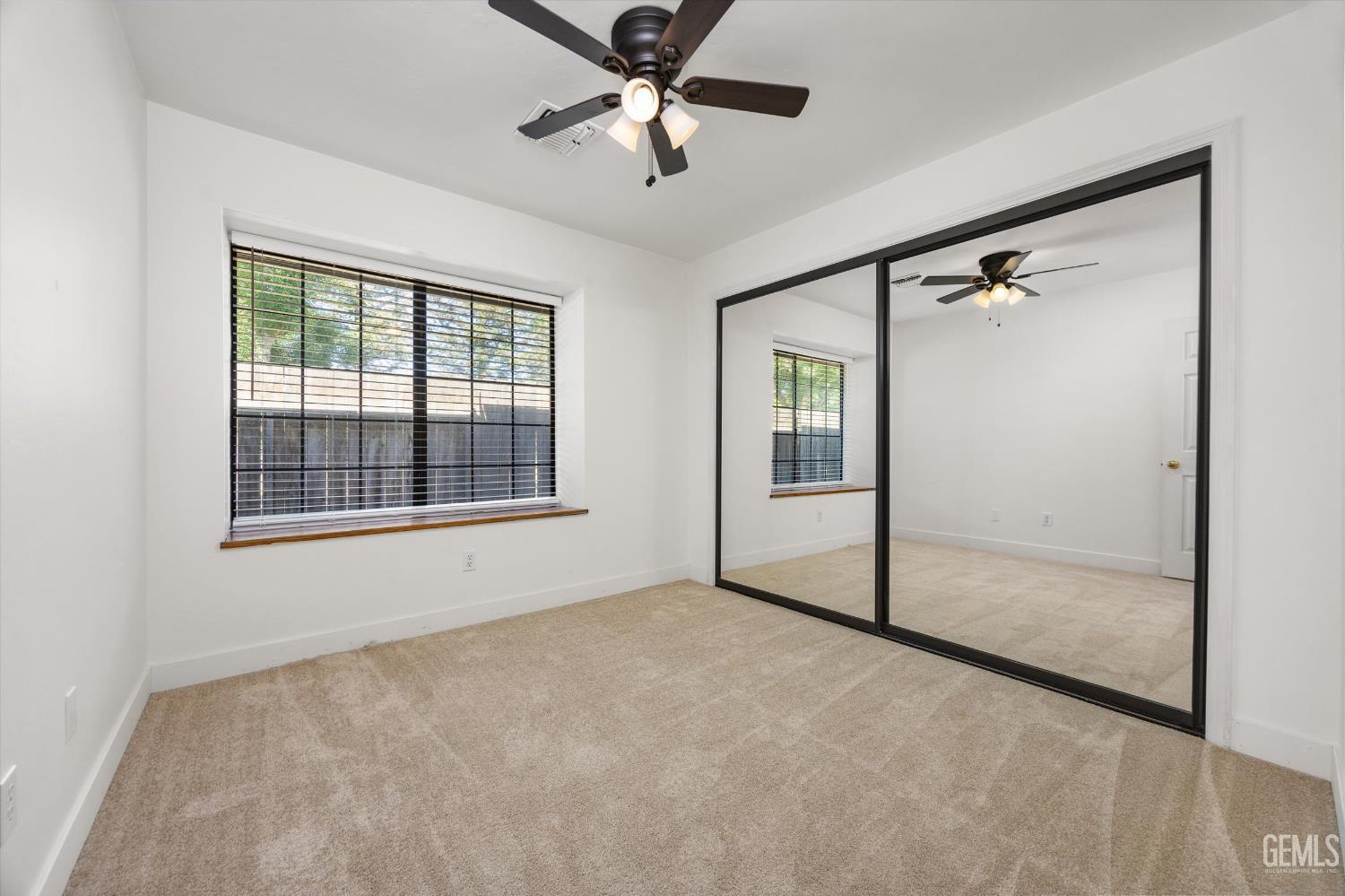 Undisclosed Address Bakersfield, CA 93314 - Photo 52 of 69 a view of an empty room with a window