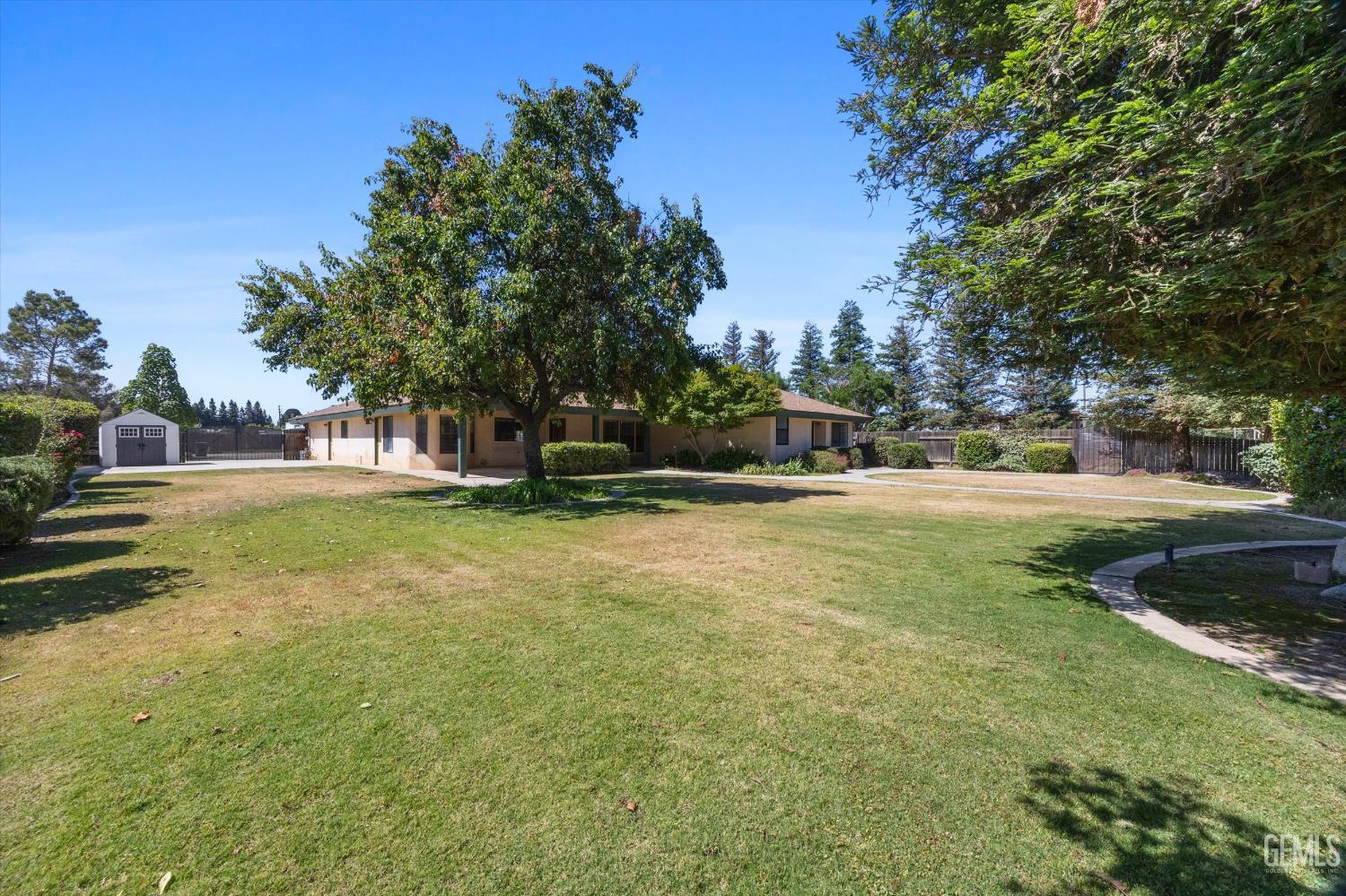 Undisclosed Address Bakersfield, CA 93314 - Photo 59 of 69 a view of a park with large trees