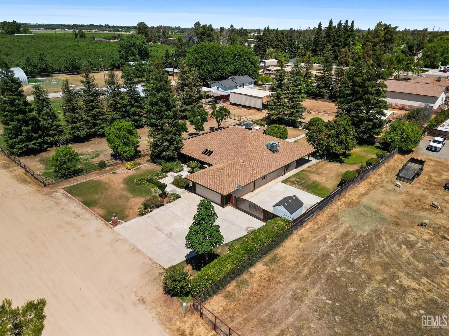 Undisclosed Address Bakersfield, CA 93314 - Photo 8 of 69 an aerial view of a house with mountain view