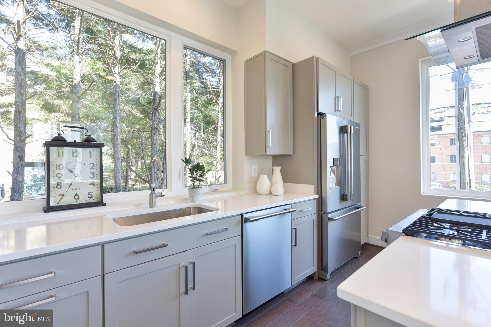 2823 24th Road South Arlington, VA 22206 - Photo 1 of 97 a kitchen with stainless steel appliances a sink a stove and a refrigerator