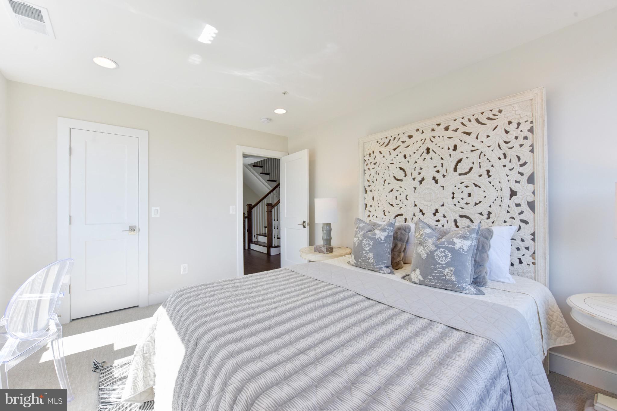 2823 24th Road South Arlington, VA 22206 - Photo 12 of 97 a bedroom with a bed and a window