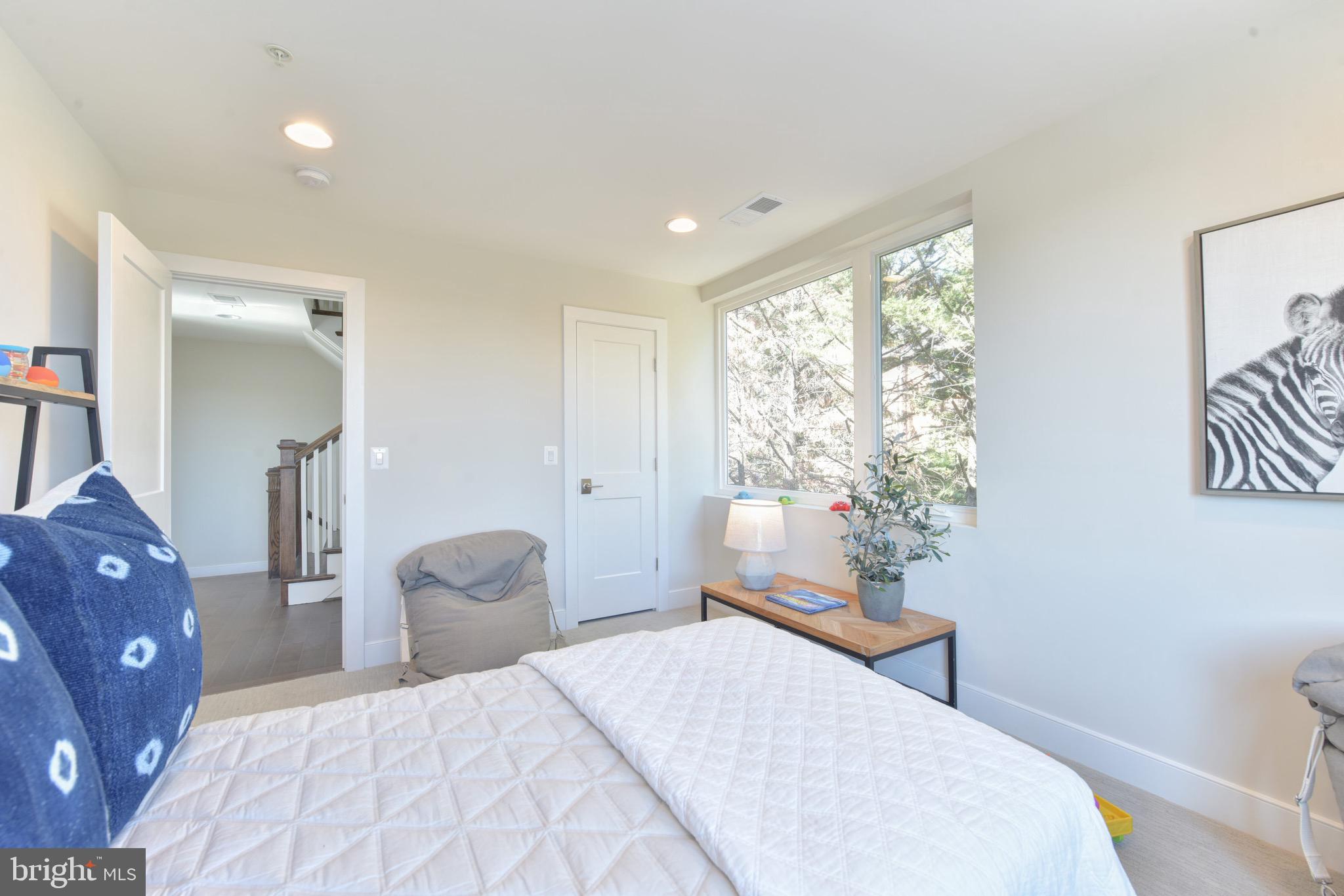 2823 24th Road South Arlington, VA 22206 - Photo 15 of 97 a bedroom with a large bed and a window