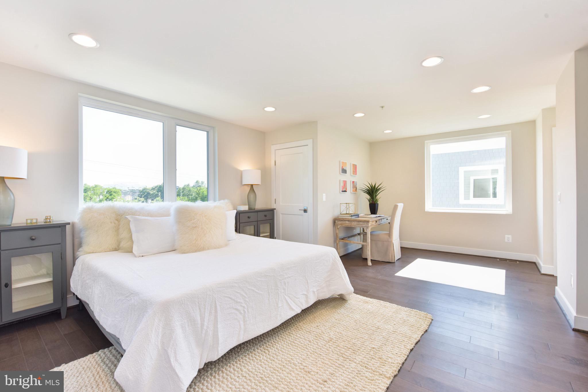2823 24th Road South Arlington, VA 22206 - Photo 19 of 97 a bedroom with a large bed and a window