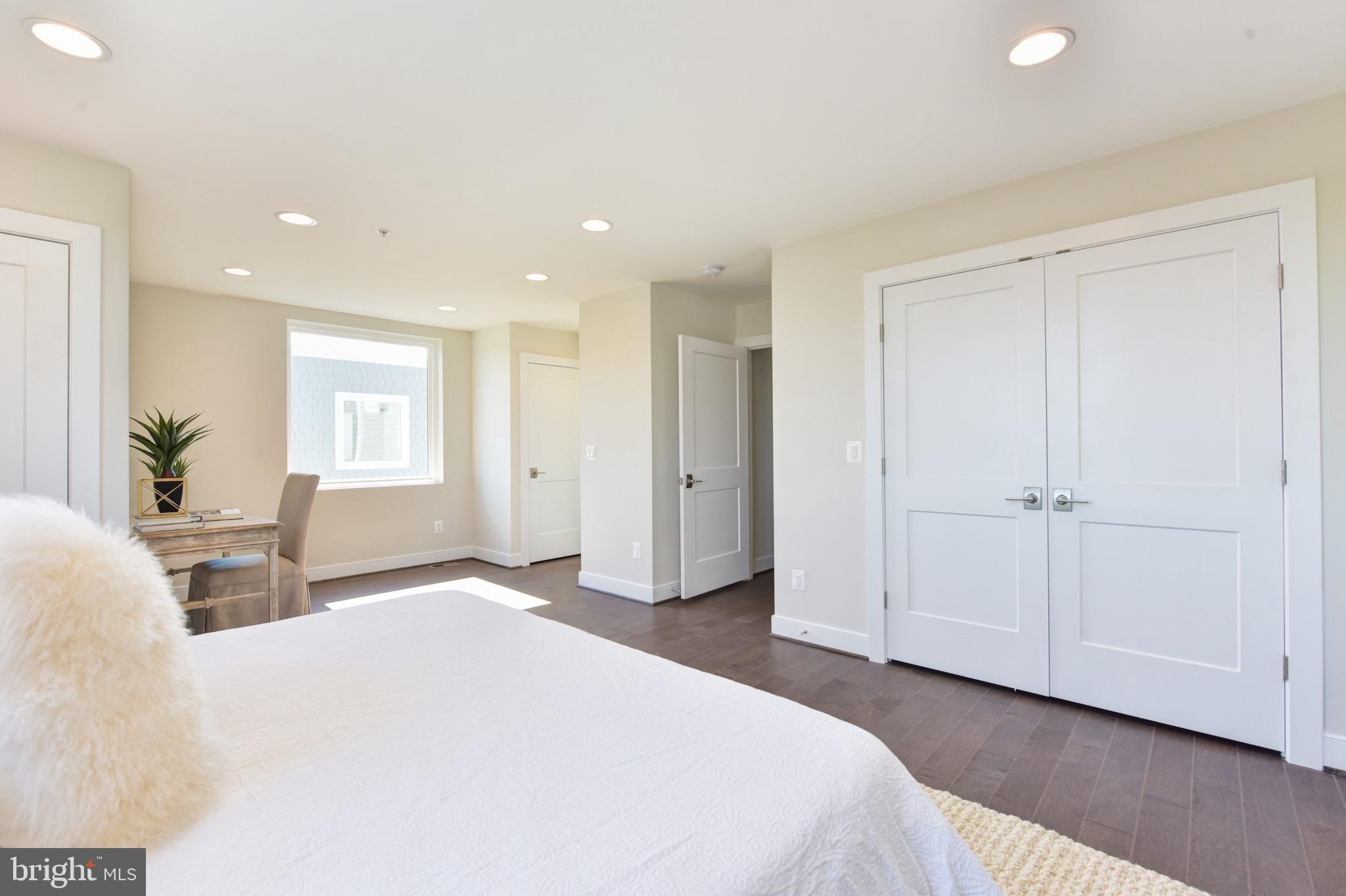 2823 24th Road South Arlington, VA 22206 - Photo 20 of 97 a spacious bedroom with a bed and a dresser