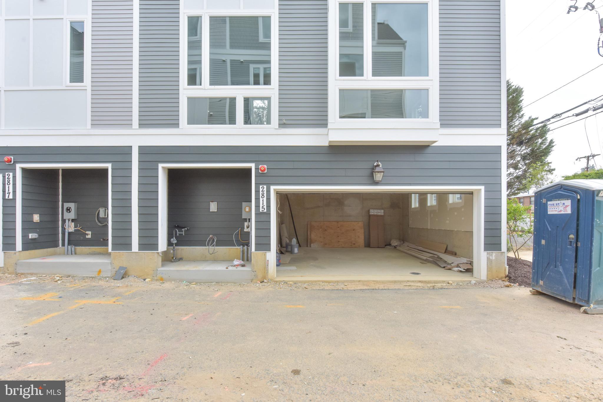 2823 24th Road South Arlington, VA 22206 - Photo 27 of 97 a front view of a building with glass windows and door