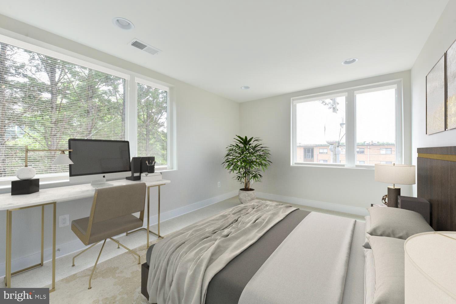 2823 24th Road South Arlington, VA 22206 - Photo 32 of 97 a bedroom with a bed and a computer on the desk
