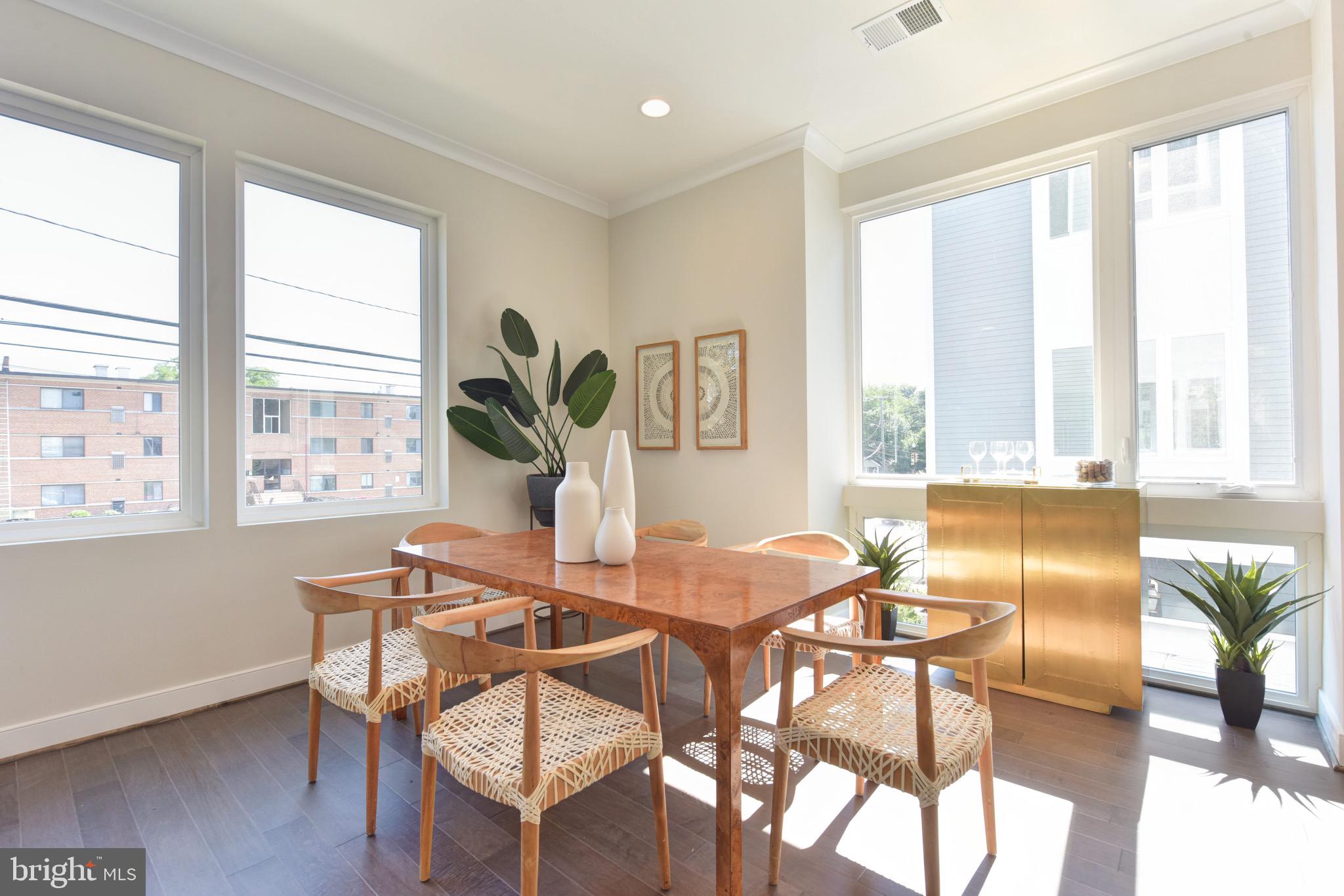 2823 24th Road South Arlington, VA 22206 - Photo 10 of 97 a view of a dining room with furniture window and wooden floor