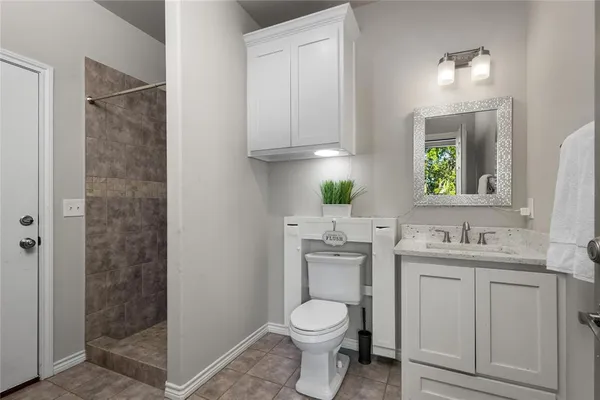 a bathroom with a sink and a washing machine