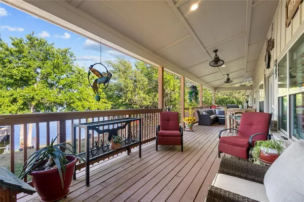 a view of a chairs and table in the patio