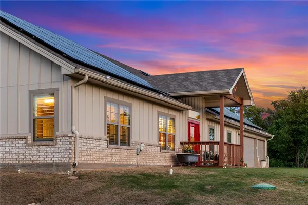 a house view with a garden space