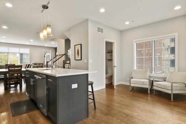 1027 Walnut Way Oak Park, IL 60302 - Photo 14 of 35 a kitchen with center island and a sink