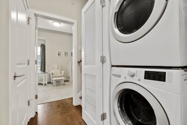 1027 Walnut Way Oak Park, IL 60302 - Photo 28 of 35 a view of a hallway with washer and dryer