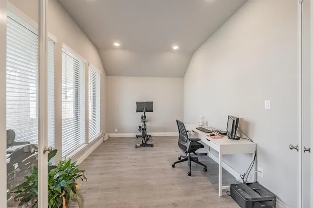 a kitchen with a sink stainless steel appliances and cabinets
