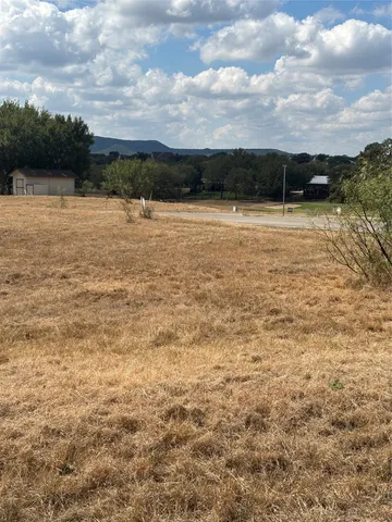 a view of a lake and sunset