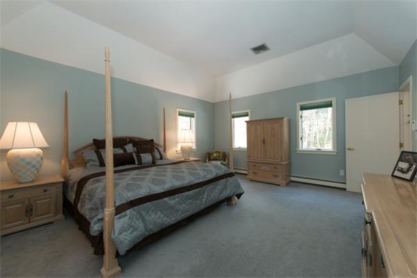 13 West Parish Road Boxford, MA 01921 - Photo 22 of 30 a bedroom with a bed a mirror and window