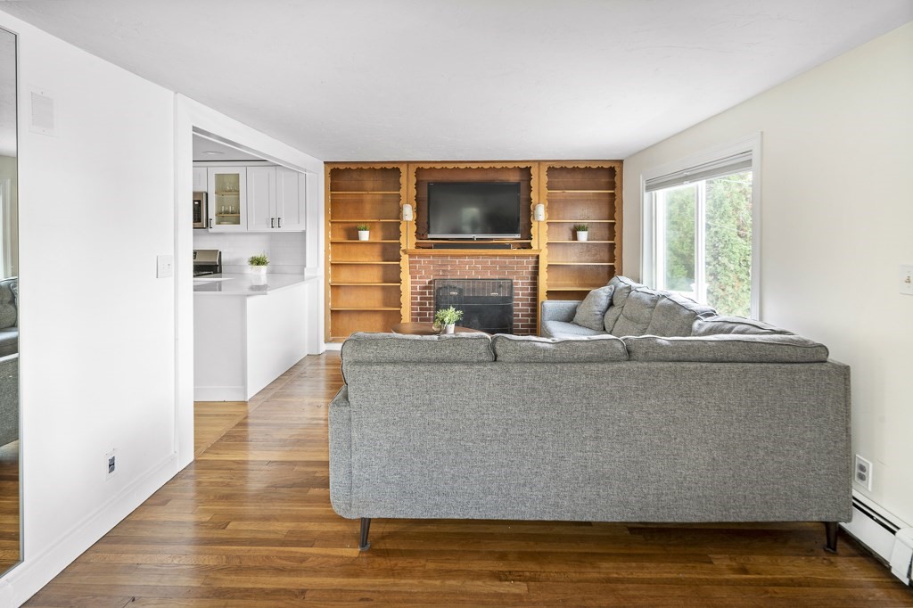 30 Crawford Road Braintree, MA 02184 - Photo 12 of 21 a living room with furniture and a flat screen tv