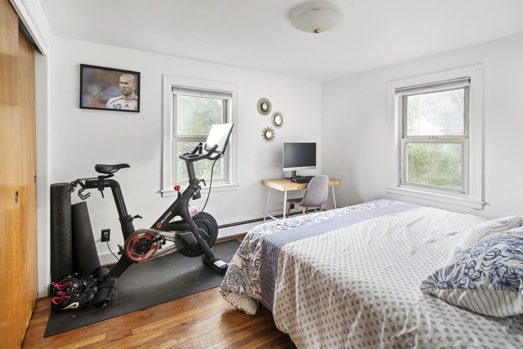 30 Crawford Road Braintree, MA 02184 - Photo 13 of 21 a bed room with a bed and a wooden floor