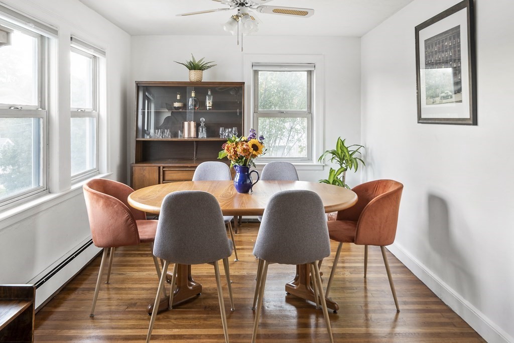 30 Crawford Road Braintree, MA 02184 - Photo 14 of 21 a dining room with furniture a chandelier and wooden floor