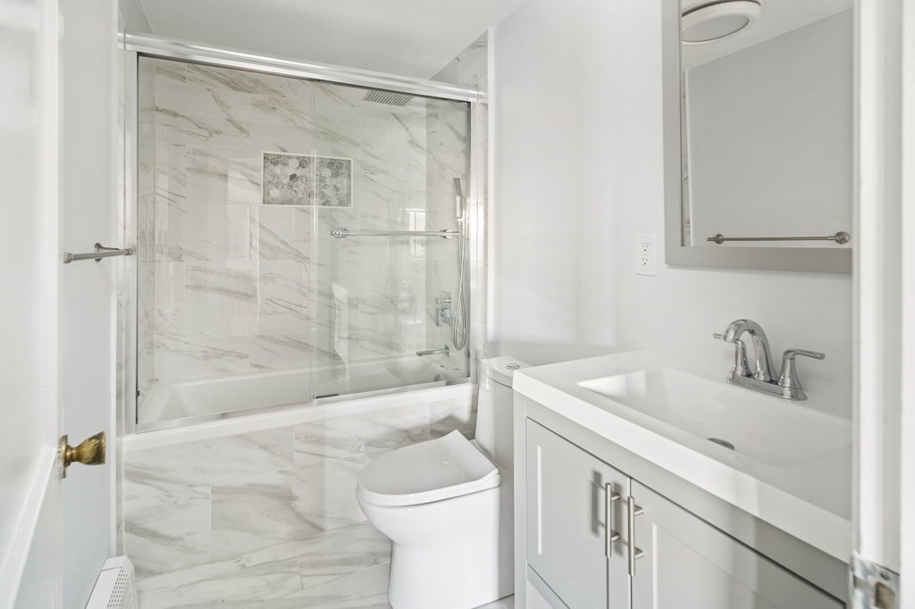30 Crawford Road Braintree, MA 02184 - Photo 7 of 21 a bathroom with a sink a toilet and shower