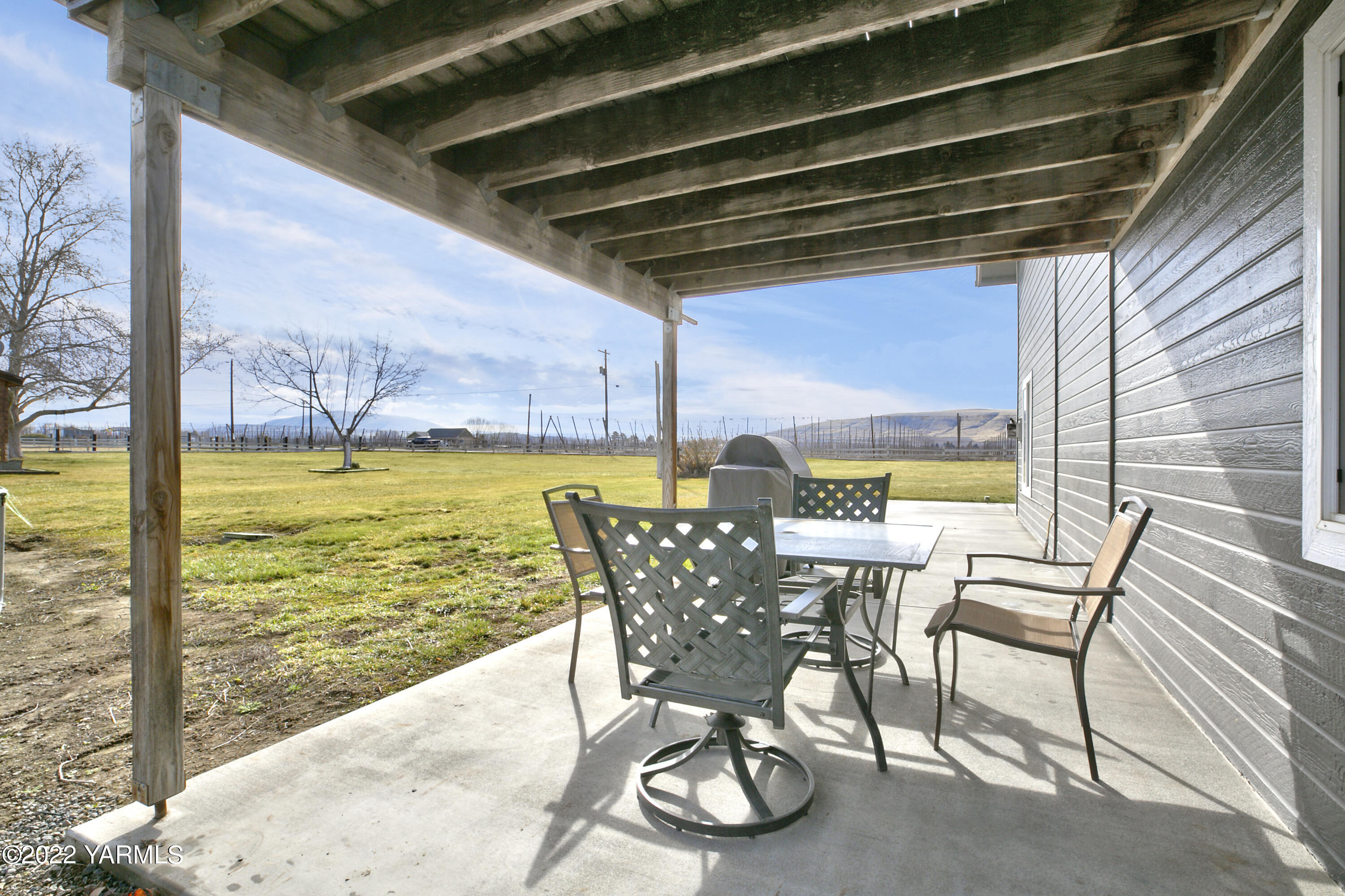 7501 Bell Road Moxee, WA 98936 - Photo 14 of 18 a view of a swimming pool with furniture