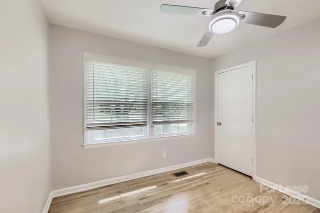 a view of a room with a window