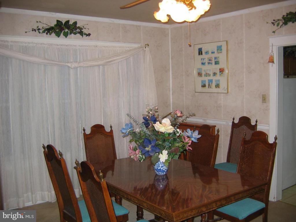 339 Front Street Lititz, PA 17543 - Photo 6 of 16 a view of a dining room with furniture and wooden floor
