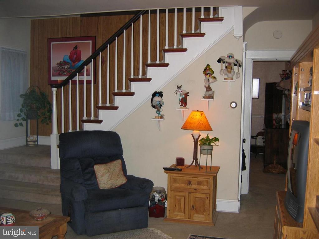 339 Front Street Lititz, PA 17543 - Photo 8 of 16 a living room with furniture and stairs