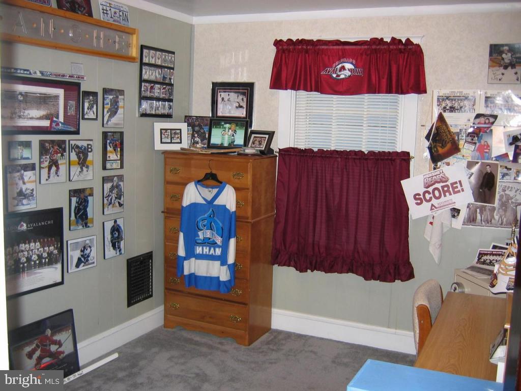 339 Front Street Lititz, PA 17543 - Photo 10 of 16 a bed room with a bed and a couch