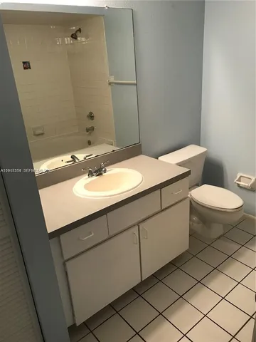 a view of swimming pool with a yard