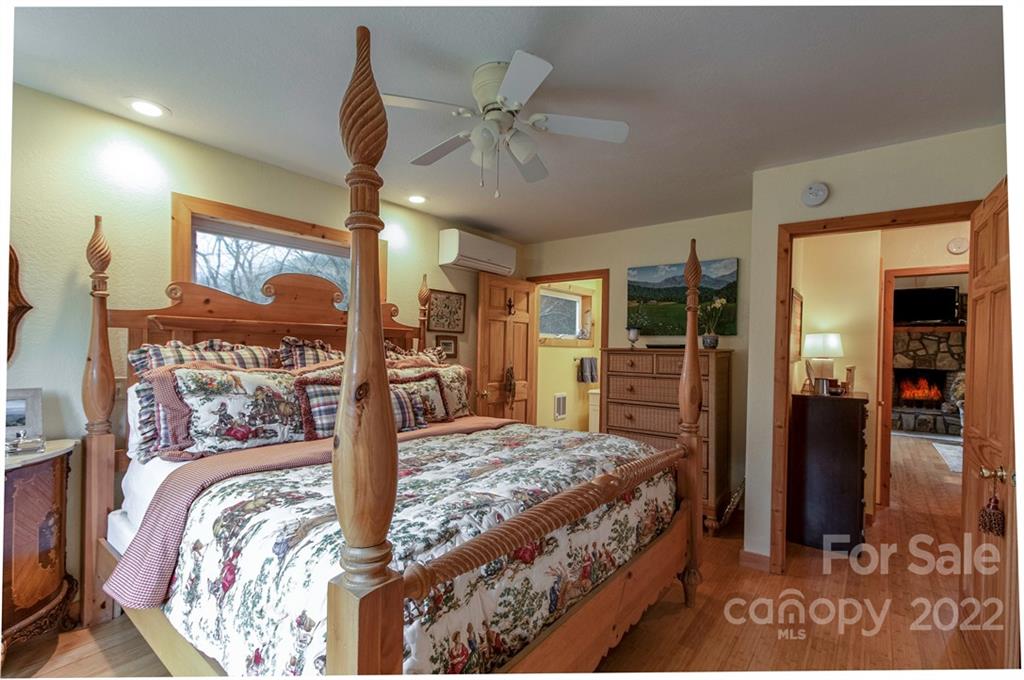 903 Davenport Road, Unit 12 Spruce Pine, NC 28777 - Photo 19 of 39 a bedroom with a bed and a walk in closet
