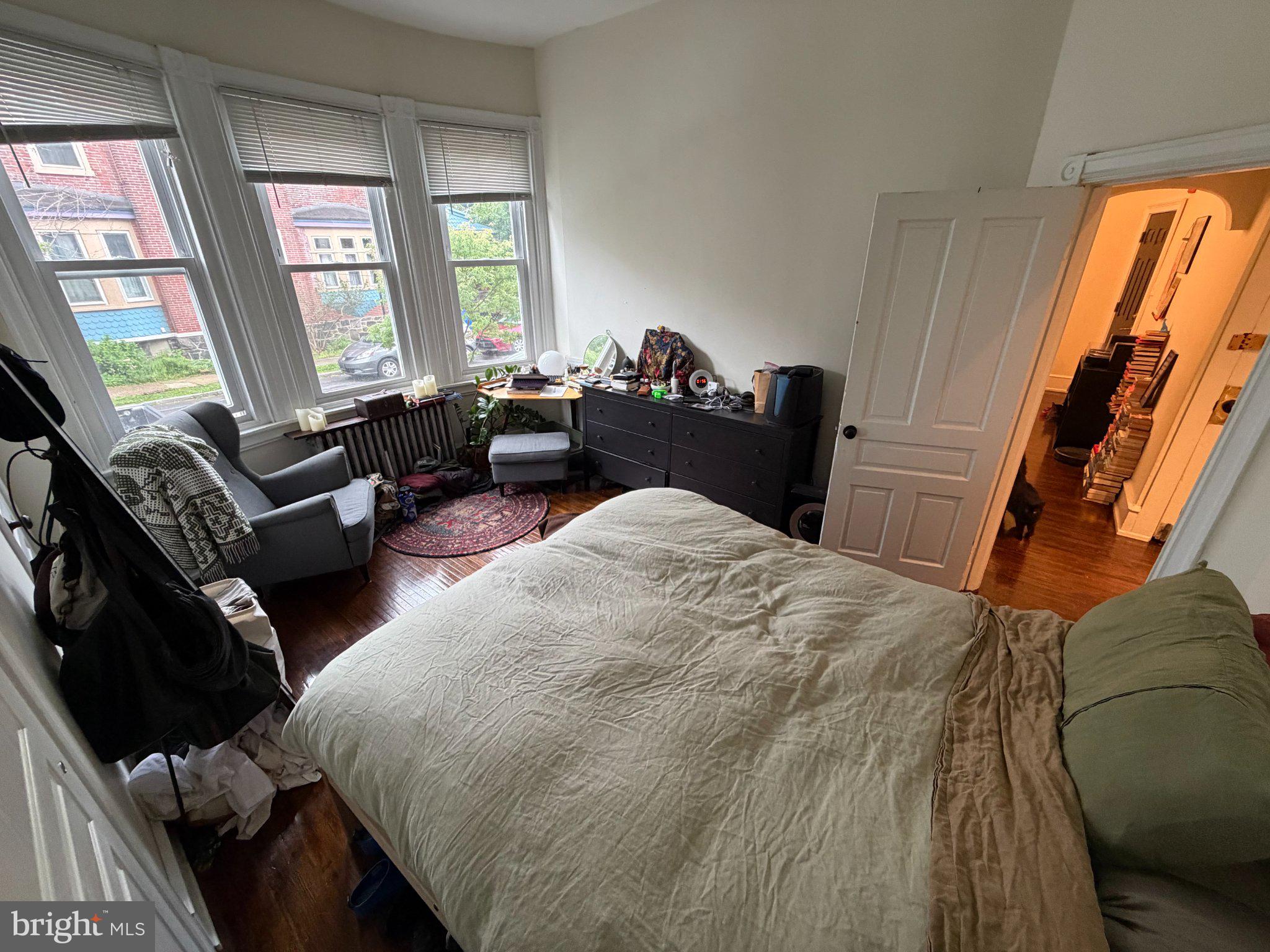 815 South 49th Street Philadelphia, PA 19143 - Photo 13 of 72 a bed room with a bed window and a couch