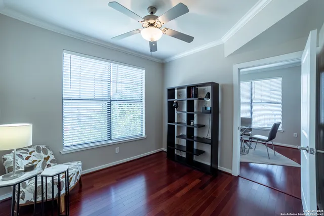 a furnished livingroom with furniture and a window