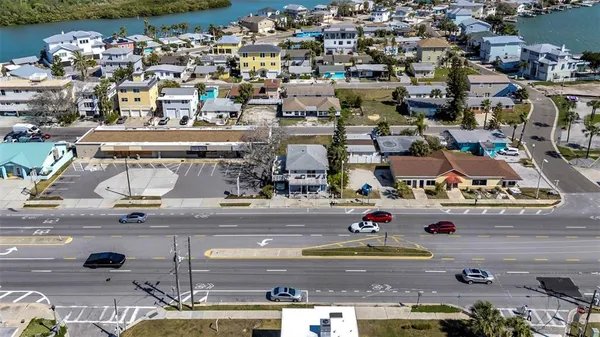 an aerial view of a houses with outdoor space