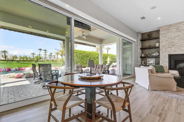 a view of a dining room with furniture window and outside view