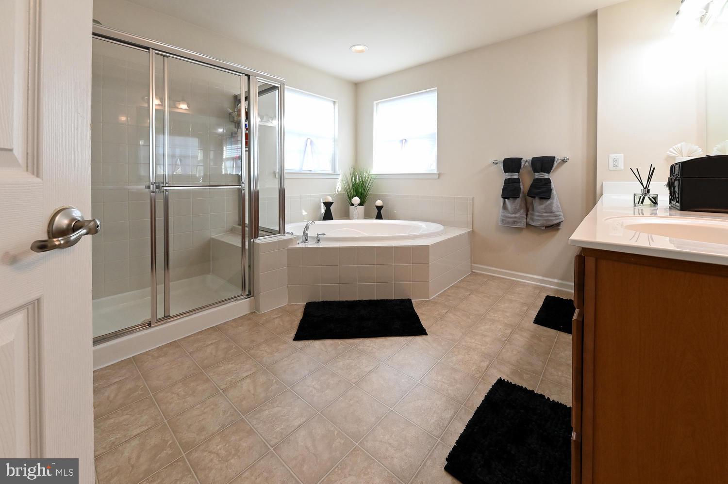 4607 Mary Beth Boulevard Clinton, MD 20735 - Photo 25 of 41 Master Bath with Sitting Tub and separate Shower