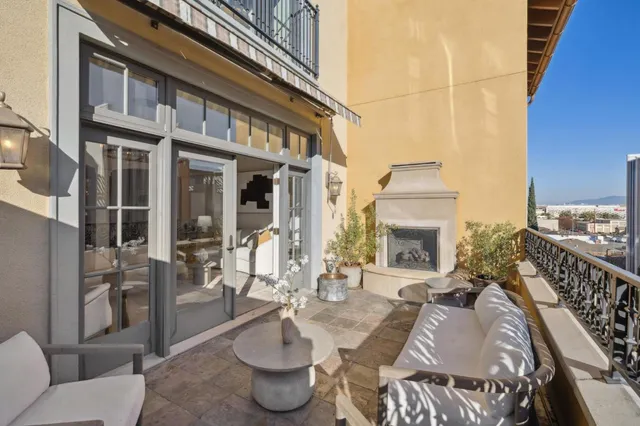 a view of balcony and patio with couches