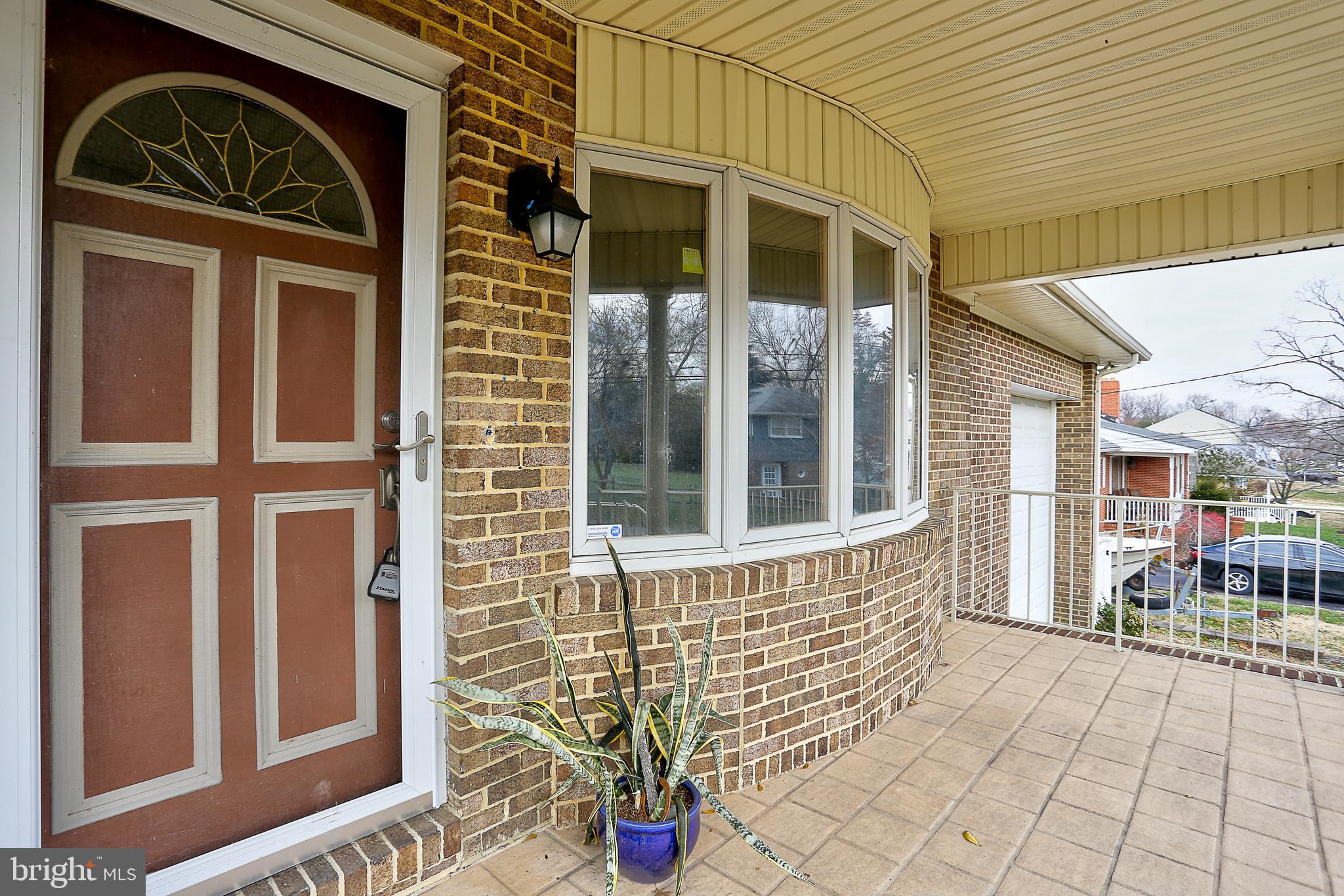 208 Inlet Drive Pasadena, MD 21122 - Photo 2 of 49 Covered Front Porch Area