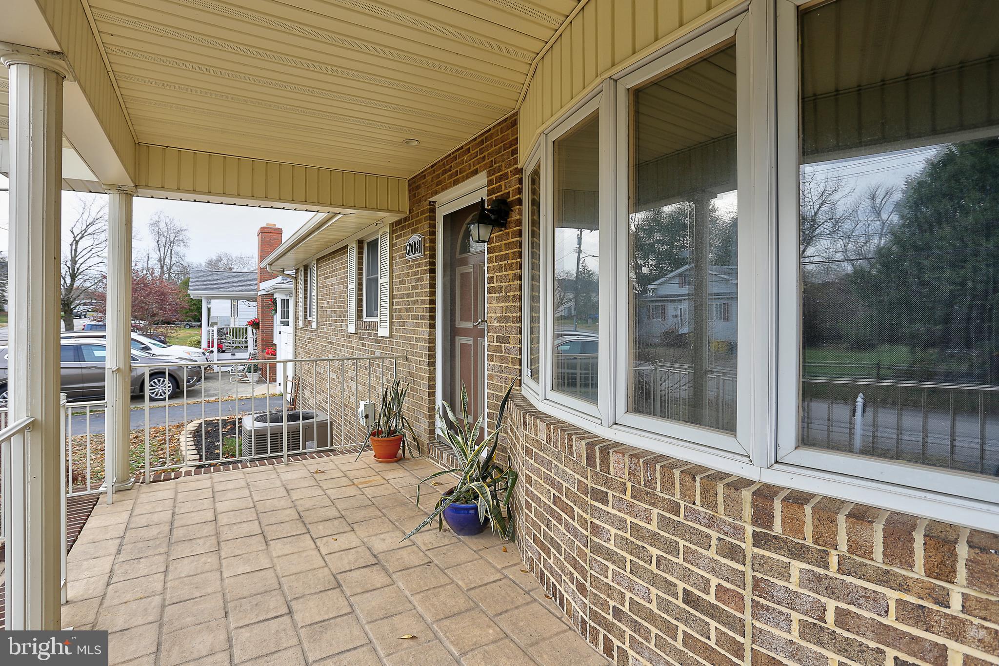 208 Inlet Drive Pasadena, MD 21122 - Photo 3 of 49 Front Pavers / Bay Window From Living Rm