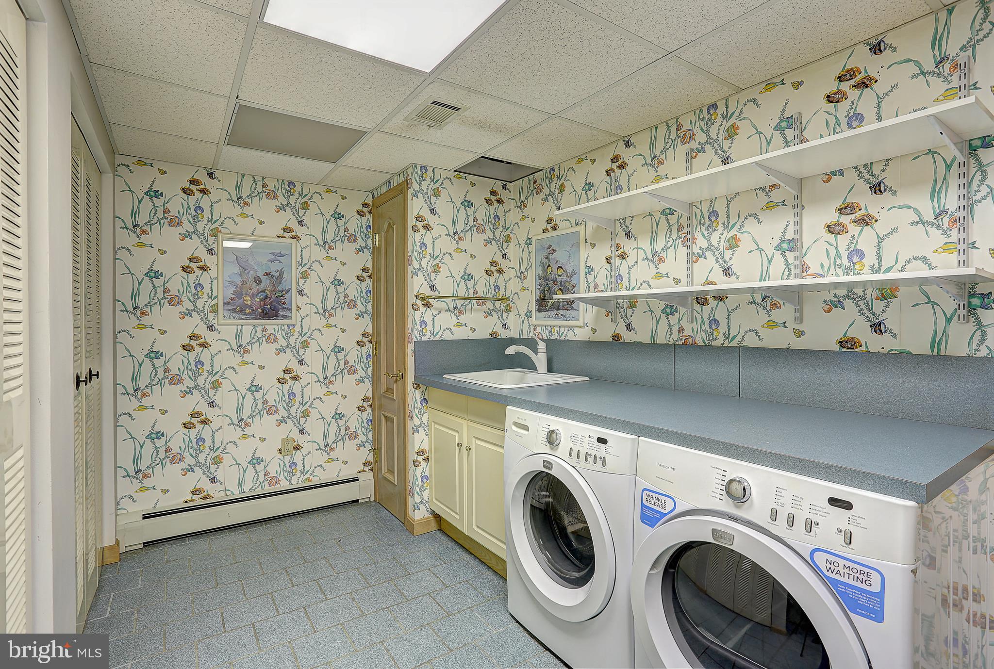 208 Inlet Drive Pasadena, MD 21122 - Photo 24 of 49 Lower Level Laundry Room with Built-In Sink