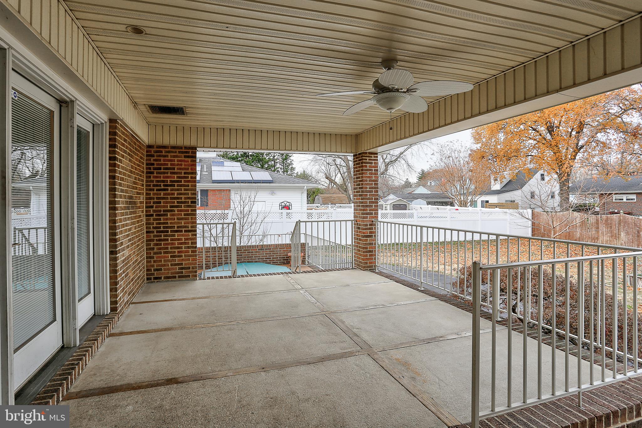 208 Inlet Drive Pasadena, MD 21122 - Photo 28 of 49 Covered Rear Porch From Kitchen Leads to Hot Tub