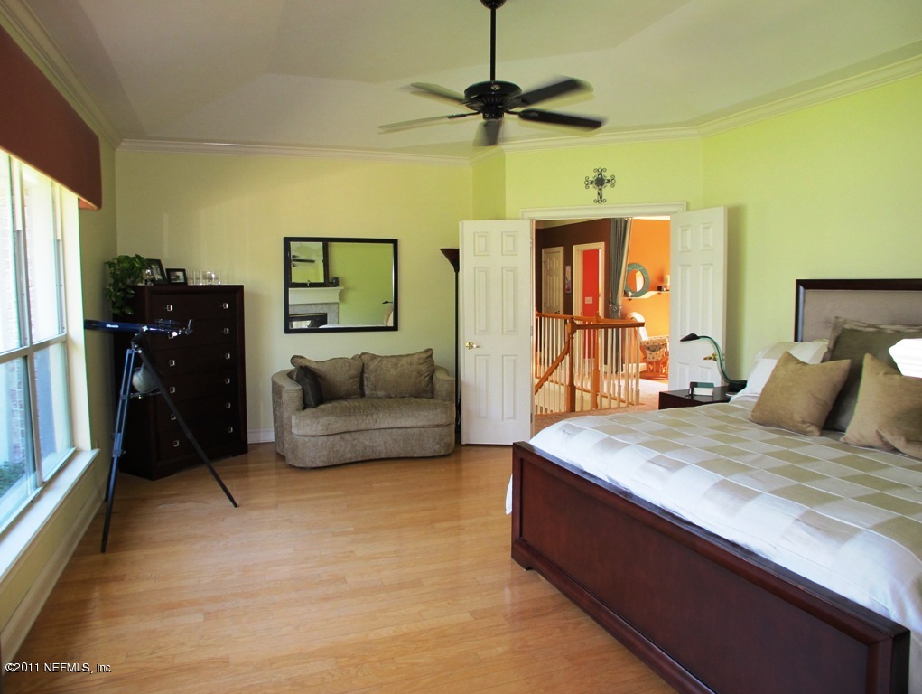 13120 Mandarin Road Jacksonville, FL 32223 - Photo 33 of 62 a living room with furniture and a flat screen tv