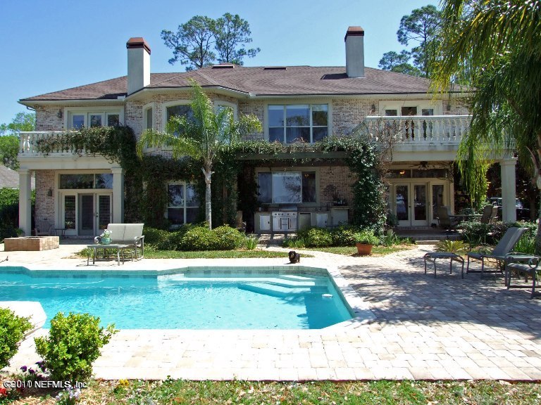 13120 Mandarin Road Jacksonville, FL 32223 - Photo 4 of 62 a front view of a house with a yard