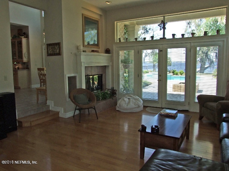 13120 Mandarin Road Jacksonville, FL 32223 - Photo 8 of 62 a living room with furniture and a large window